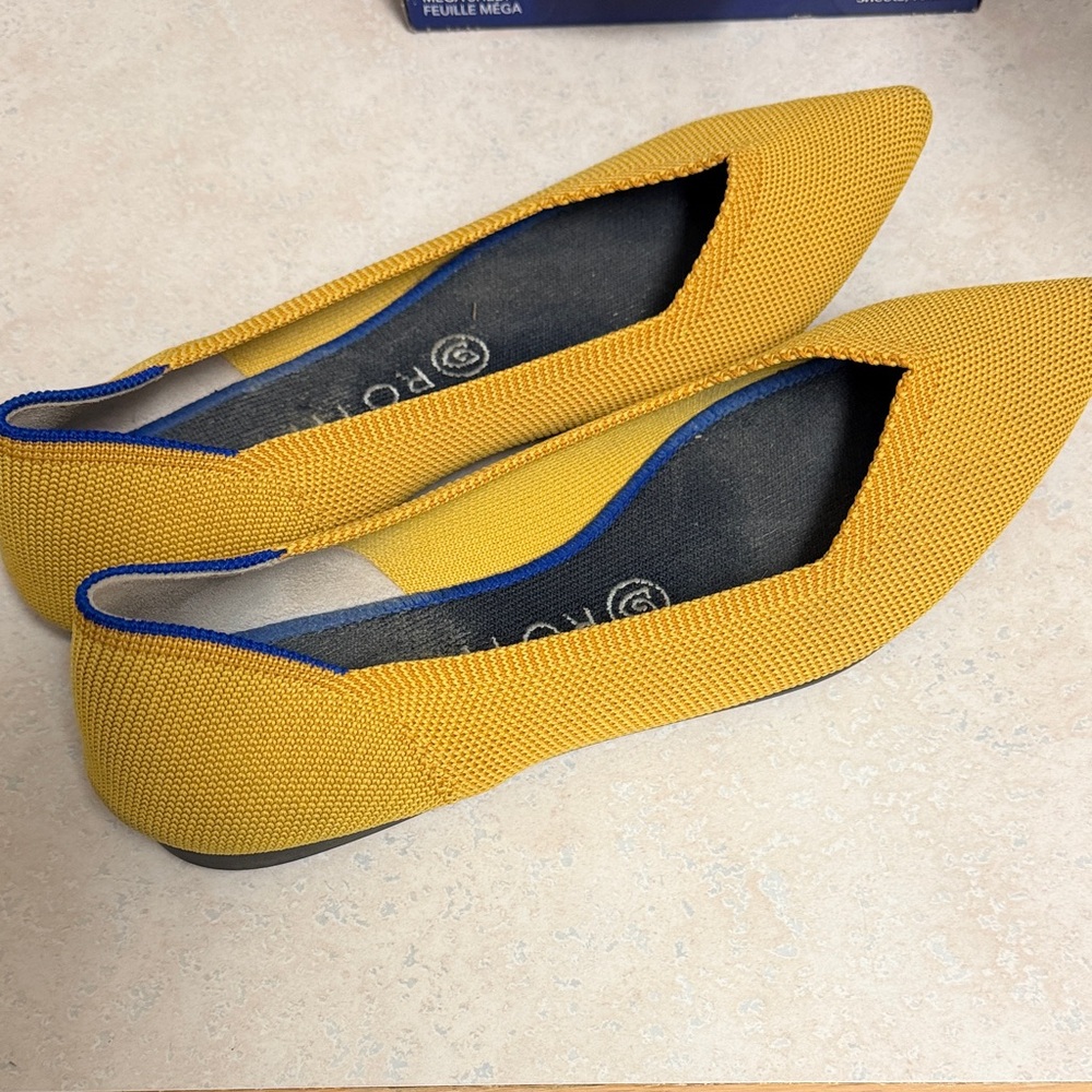 Rothy's Mustard Yellow Flats with Blue Trim